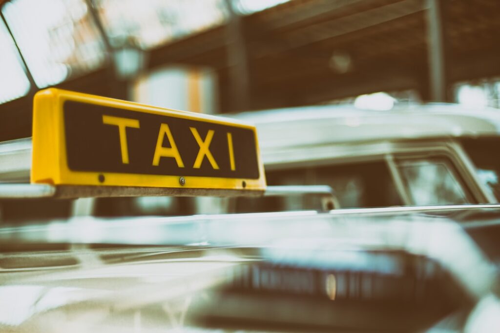 Yellow taxi roof sign on a licensed hackney carriage vehicle